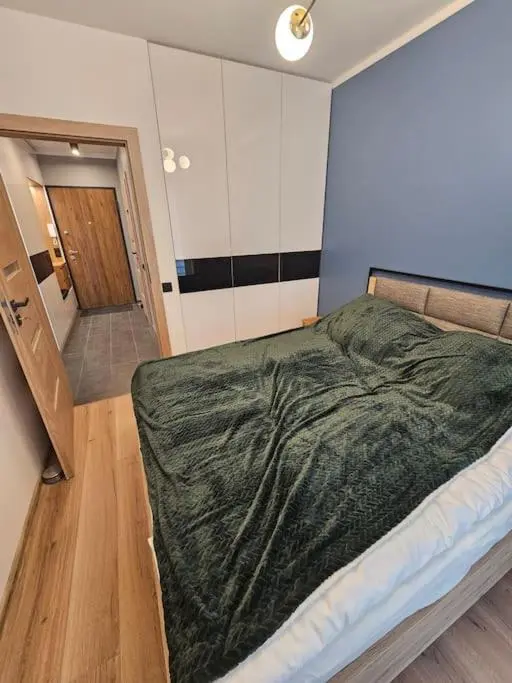 Image 6 of Apartament przy Loftach u Scheiblera parking podziemny, Śniadaniownia