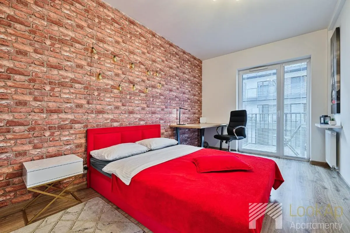 Image 1 of Apartment Industrial Red by LookAp – parking, klimatyzacja