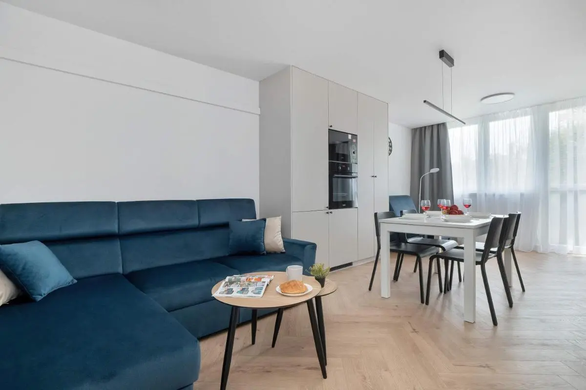 Image 5 of Blue and White Apartment in Łódź with Furnished Balcony by Noclegi Renters