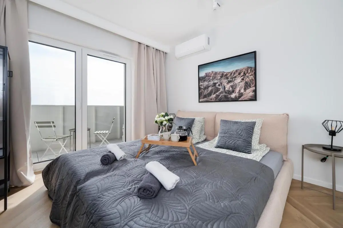 Image 1 of Manufaktura Suites – 76m2, Parking, AirCon – by Rentujemy