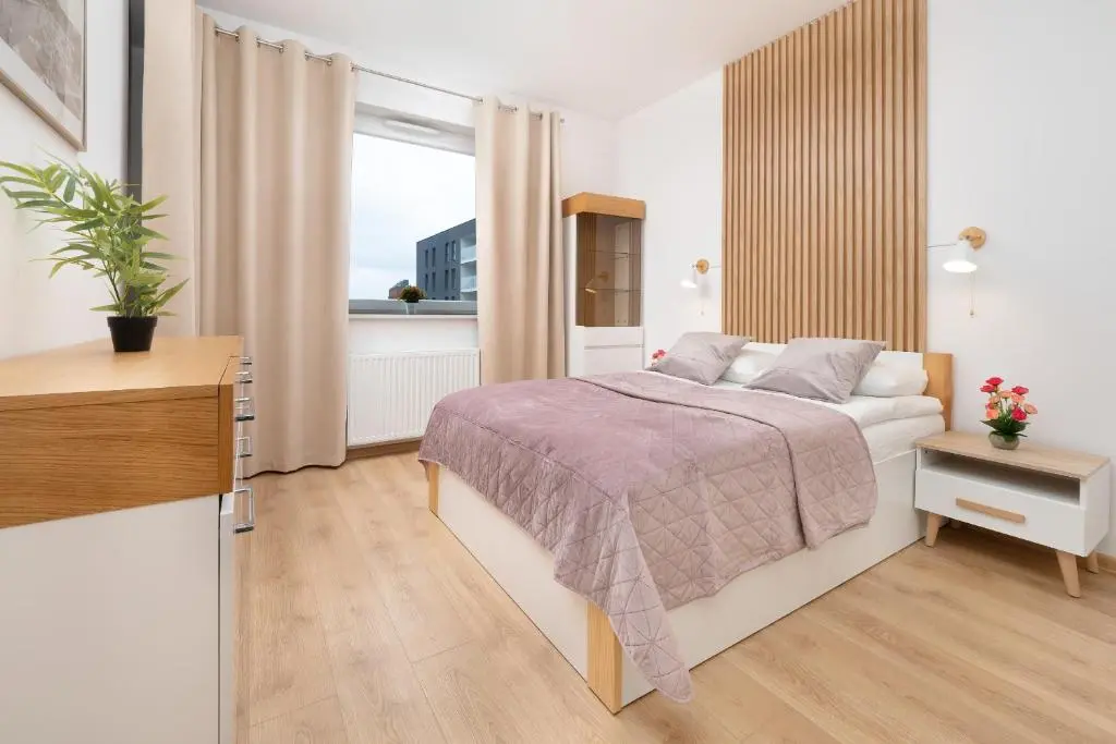 Image of Modern Apartment with Parking & Near Manufaktura in Łódź by Noclegi Renters