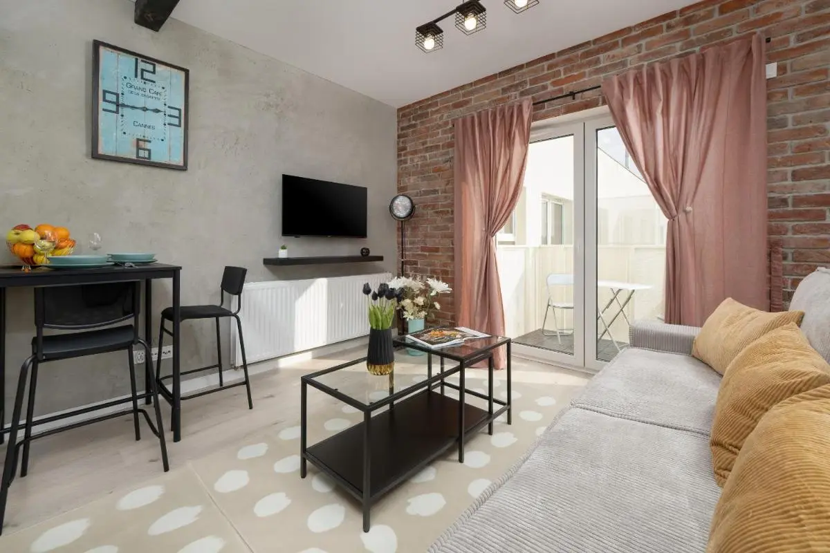 Image 1 of Modern Studios Wróblewskiego with Balcony and Free Parking by Noclegi Renters