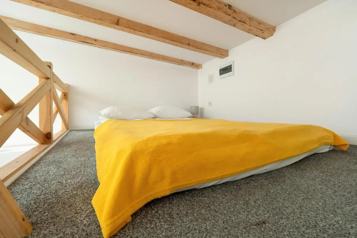 Image 1 of Przytulne Studio z Antresolą w Łodzi by Noclegi Renters